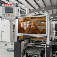 Machine d'emballage de papier A4 à haute efficacité, commande de tension magnétique, entraînement par servomoteur, pour l'utilisation en usine d'emballage de papier d'impression