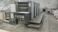 Machine d'impression offset d'occasion HEIDELBERG Speedmaster SM74 4 couleurs 2009 format B2 avec Prinect Press Center