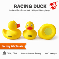Canards en caoutchouc numérotés avec logo personnalisé, lestés au bas, auto-redressants, jaunes, pour événements de course, vente en gros