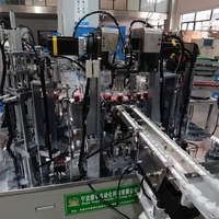 Machine d'assemblage exclusive pour équipement d'automatisation à haute efficacité et économique, pour la fabrication d'émulsions et de sprays fixateurs, avec moteur