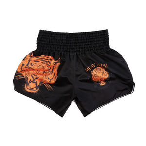 Vente en gros d'usine <span class=keywords><strong>de</strong></span> shorts <span class=keywords><strong>de</strong></span> muay-thaï tigre avec logo personnalisé pour hommes sublimation unie combat <span class=keywords><strong>de</strong></span> boxe brésil MMA grappling shorts - Product Image 3