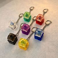 Porte-clés anti-stress lumineux à LED avec clavier mécanique et bouton de clic, jouet sensoriel pour clavier