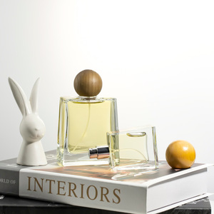 Nuevo suministro 30ml/100ml botella de Perfume de vidrio tipo empuje trapezoidal con fondo grueso y redondo para tapa de madera de bola - Product Image 1