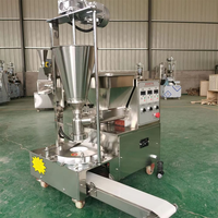 Petite machine automatique de fabrication de mochi, de petits pains farcis cuits à la vapeur, de siopao, de baozi et de petits pains au porc