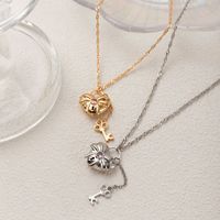 Collier avec pendentif médaillon ouvrable en forme de cœur, plaqué or, personnalisable avec photo, pour femme