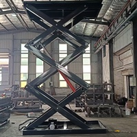 Elevador de Carga Xinchaoyue con Certificación CE, Elevador Eléctrico con Altura de Elevación de 3-15 m, Plataforma de Elevación Fija, Construcción de Acero, Capacidad de Carga de 650 kg a 50000 kg