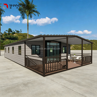 Maison modulaire pliable en forme de conteneur à panneaux sandwich extensibles à double aile, maison préfabriquée miniature portable pour l'extérieur