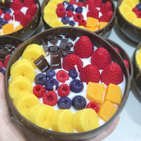 Bougie artisanale en coquille de noix de coco parfumée aux fruits, en cire de soja, pour décoration intérieure, cadeau de Noël, de fête ou d'anniversaire, vente en gros