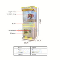 Machine à griffes à monnayeur, jeu d'arcade avec plateau de prix rotatif, éclairage LED et affichage de plusieurs cadeaux pour centre commercial