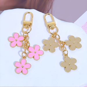 Kawaii Metal Flower Keychain Minimalist Enamel Floral <b>Keyring</b> Elegant Bag <b>Charm</b> Key Accessory Perfect Gift for Women & Girls - Product Image 2