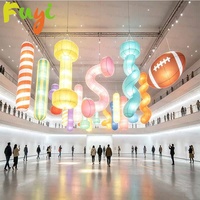 Ensemble d'art suspendu gonflable géant durable et écologique avec formes lumineuses pour les halls d'exposition