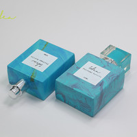 Botella de Perfume de Vidrio de 50 ml con Cabezal Pulverizador, Decoración Personalizada, Venta Caliente, Precio Bajo, Transferencia de Calor al Vacío, Efecto Marmoleado Azul Cielo