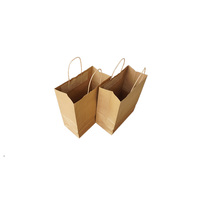 Umweltfreundliche braune Kraftpapier-Einkaufstaschen aus recyceltem Karton mit langen Henkeln für Weihnachtsgeschenkverpackungen im Großhandel