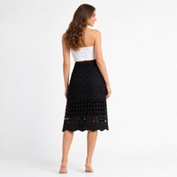 Jupe mi-longue noire taille haute élastique en crochet de polyester pour femme, style bohème, tendance, élégante, idéale pour les vacances d'été, vente en gros, avec logo personnalisé