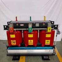 Transformateur industriel toroïdal triphasé à isolation sèche 1000 kVA haute efficacité 10 kV isolation en résine sortie 380 V avec boîtier