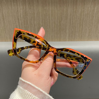 Montures optiques tendance avec couleurs contrastées, lunettes anti-lumière bleue, charnières métalliques, montures de lunettes œil-de-chat pour femmes, vente en gros