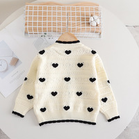 Ensemble de vêtements d'automne et d'hiver pour filles jupe tricotée pull creux en forme de cœur ensemble deux pièces à manches longues vêtements pour enfants