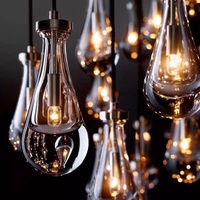 Lustre gouttes de pluie en cristal d'escalier éclairage rond grand lustre pendentif haut plafond luxe longue goutte de pluie lustre