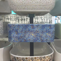 Évier de comptoir ovale brillant en pierre artificielle Art Déco noir et blanc marbré pour la rénovation de salles de bain d'appartements et de villas