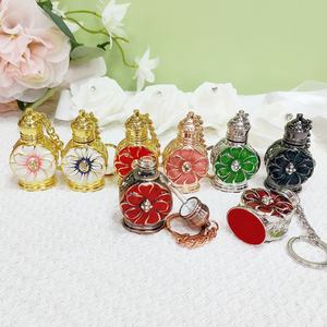 ขวดน้ำหอมขนาดเล็ก 3 มล. แบบพวง<span class=keywords><strong>กุญแจ</strong></span> โลหะผสมรูป<span class=keywords><strong>ดอก</strong></span>ไม้ ขวดแก้วแบบอาหรับสำหรับน้ำมันหอมระเหยแบบเติมได้ # 887 - Product Image 1