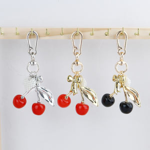 พวงกุญแจโลหะรูปเชอร์รี่คริสตัล 3 มิติ คุณภาพสูง สำหรับ<span class=keywords><strong>กระเป๋า</strong></span>ถือ <span class=keywords><strong>กระเป๋า</strong></span><span class=keywords><strong>สะพาย</strong></span><span class=keywords><strong>ข้าง</strong></span> ของผู้หญิง แฟชั่นระดับไฮเอนด์ - Product Image 1