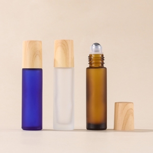 Flacon roll-on brun 10 ml, flacon <span class=keywords><strong>de</strong></span> <span class=keywords><strong>parfum</strong></span> transparent givré, flacon d'huile essentielle en verre bleu avec bouchon en <span class=keywords><strong>bois</strong></span> <span class=keywords><strong>grain</strong></span>é - Product Image 3