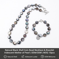 Ensemble collier et bracelet en perles disques coquillage noir naturel, nacre irisée 12mm, entretoise argentée, Dark Luxe, vente en gros OEM