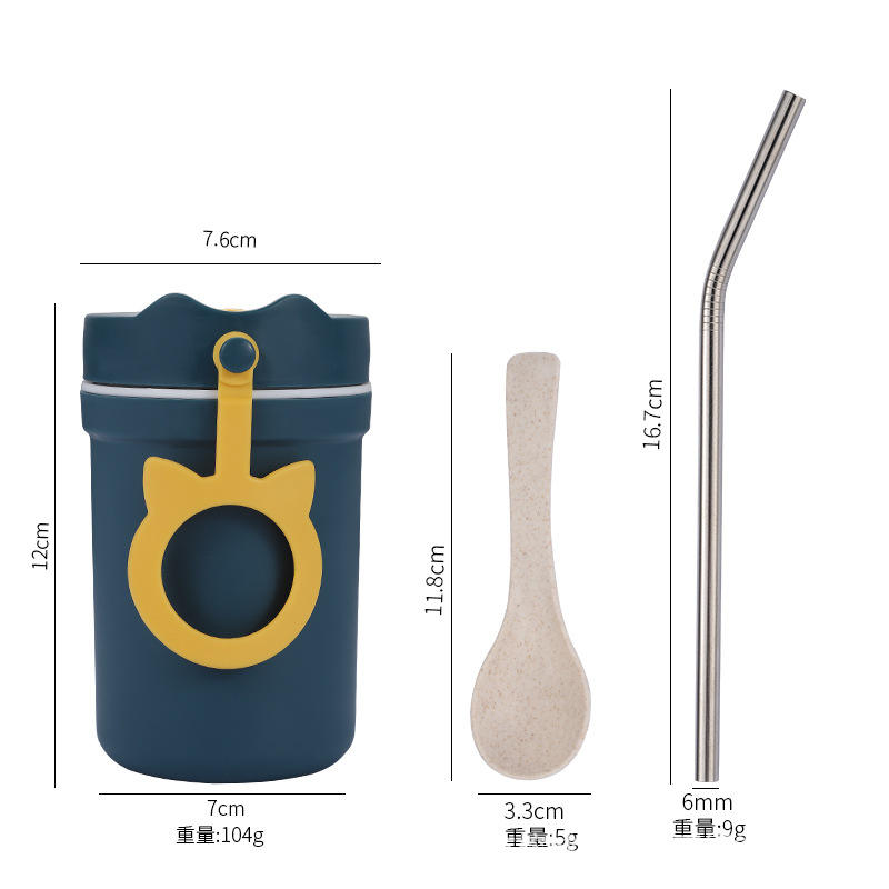 blue cup with spoon and straw