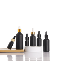Flacon compte-gouttes en verre noir personnalisé avec bouchons en caoutchouc noir 5ml 10ml 15ml 20ml pour huiles essentielles, sérums et emballages cosmétiques
