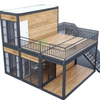 Maison préfabriquée modulaire de luxe à deux étages, assemblage rapide, conteneur de 20 pieds avec cuisine, salon et terrasse sur le toit