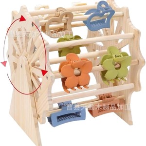 Creative wooden display rack with claw clips and hair accessories, 360-degree rotating Ferris wheel design. - Product Image 1