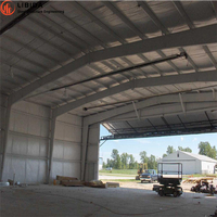 Hangar d'atelier préfabriqué en acier insonorisé pour avions, avec structure en treillis d'acier renforcé robuste et intelligente, 35x65 pieds