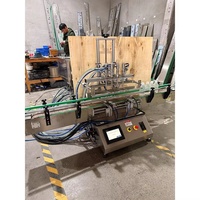 Machine de remplissage automatique de purée de fruits à quatre têtes pneumatiques pour bureau