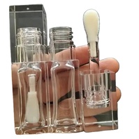 Flacon de brillant à lèvres transparent vide en PET rond avec grand applicateur, tubes repulpants pour les lèvres, emballage