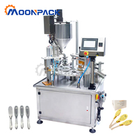 Machine de remplissage et de scellage rotative automatique Moonpack pour cuillères jetables en plastique de 15g, idéale pour le miel, la confiture, le sirop et la pâte