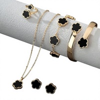 Ensemble de bijoux trèfle à quatre feuilles en alliage électroplaqué, comprenant collier, bracelet, bague et boucles d'oreilles, idéal pour le bureau et la carrière - Meilleures ventes