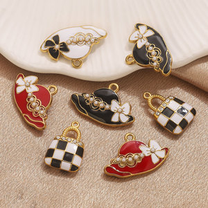 เครื่องประดับรูปหมวกและกระเป๋าถือเคลือบเงา18K PVD ชุบทองจี้สแตนเลสหมวกแฟชั่นสำหรับผู้หญิงพร้อมไข่มุกและโบว์สำหรับทำเครื่องประดับ - Product Image 4