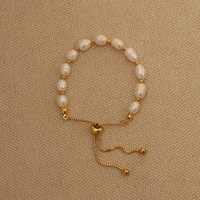 Bracelet réglable en acier inoxydable avec chaîne à pompon, bracelet en perles d'eau douce plaqué or pour femme, vente en gros de bijoux