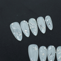 Uñas artificiales hechas a mano, en forma de almendra, estilo blanco, estilo columna de acero pequeño, fábrica reutilizable de alta calidad al por mayor.