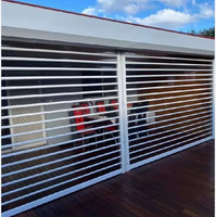 Porte à enroulement en aluminium moderne, étanche et finie, avec rideau à enroulement en cristal pour magasin