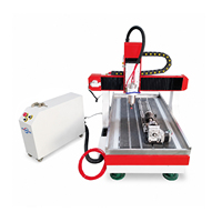 Router CNC de 4 Ejes Jinan Mosencnc 600x900 con Dispositivo Rotatorio, Husillo Refrigerado por Agua de 2.2kW, Mesa con Ranura en T, Motor Versátil para Corte/Grabado