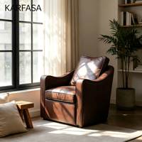 Fauteuil de lecture en cuir marron avec garniture cloutée, dossier capitonné et pieds en bois massif pour salon et bureau à domicile