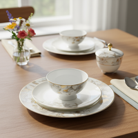 Ensemble de vaisselle florale de style européen de luxe, vaisselle en céramique écologique sur mesure, assiettes à dîner à base de plantes en gros