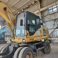 Excavatrice sur pneus Komatsu PW150-7 d'occasion, 15 tonnes, haute performance, engin de construction avec boîte de vitesses et pompe, prix avantageux