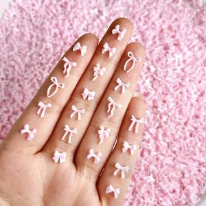 100 pièces doux ciel bleu <span class=keywords><strong>Mini</strong></span> résine arc Nail Art décoration 3D mixte blanc rose ruban arc ongles breloques en vrac fournitures manucure bricolage - Product Image 1