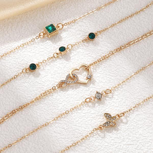 Parures de bijoux plaqués or pour femmes, style minimaliste, avec bracelet et collier sertis d'émeraudes taille cœur, pour un usage quotidien, bijoux raffinés - Product Image 1