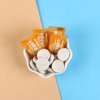 Vente en gros de comprimés de pastilles de vitamine C et de mandarine en vrac Bonbons aromatisés aux fruits au goût de menthe pour restaurants et hôtels