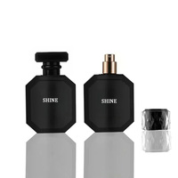 Vente en gros Polygone personnalisé noir mat élégant flacons de parfum en verre avec boîtes et sacs ronds personnalisables emballage pour dames