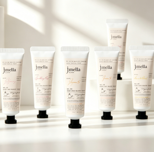 JMELLA en FRANCIA Crema de Manos Perfumada con Aroma a Peonía, Mascarilla de Manos 2 en 1, Hecha en Corea, Crema Exfoliante y Nutritiva, Venta al por Mayor - Product Image 1