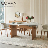 Table à manger ovale de style nordique avec pieds en bois de frêne et plateau en marbre pour usage domestique et commercial, capacité 6 personnes